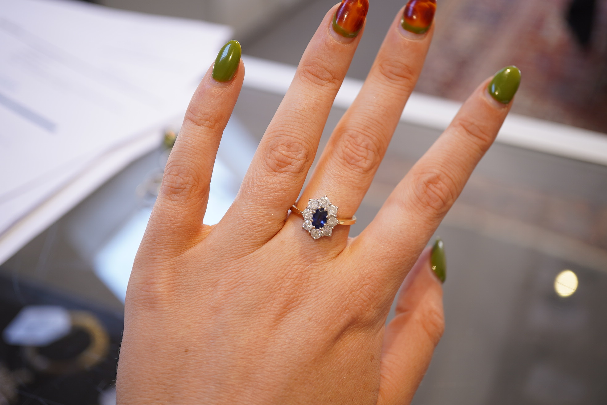 A sapphire and diamond cluster ring